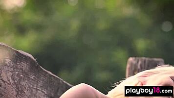 Hungarian Blondie Mikki Galante Reveals Her Fresh Shaved Pussy on a Floral Meadow During Outdoor Striptease