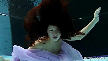 Blackhaired Aneta Relaxing In The Pool