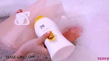 enchanting brunette muse enjoys a sensual bath