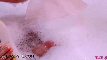 enchanting brunette muse enjoys a sensual bath