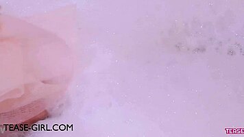 enchanting brunette muse enjoys a sensual bath