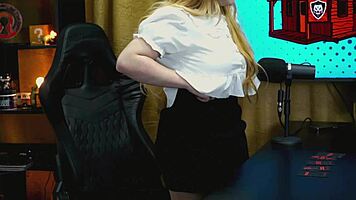 blonde bends over podcast table as tiny panties reveal her soaked pussy
