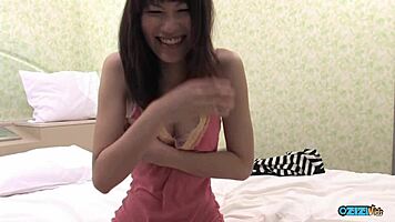 sexy asian bitch rubs clit with toy on puffy nipples