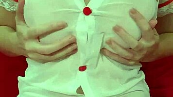 Pretty blonde teases huge tits in see-through dress close-up amateur