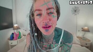 heavily inked goth teen fucks herself deep with huge dildo on bed
