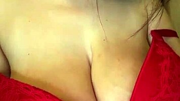 milf massages big natural tits in red bodysuit