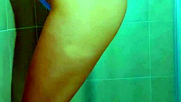 College stunner slips off Brazilian thong in steamy shower tease