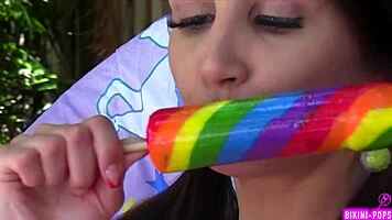 Skinny tattooed student flashes bikini outdoors for dirty tongue play