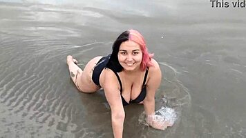 pregnant african beauty seduces beach crowd with her sexy belly