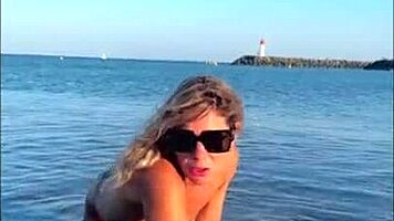 blonde euro babe kleo teases her wet tight pussy on sunny beach