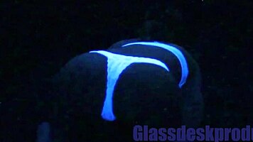 Scarlett Johnson glows under blacklight in mysterious solo tease