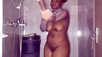 real african girl next door baths naked showing plump perky tits for fetish fans