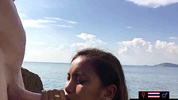 Hey asian teen sucking big european cock outdoors publicly