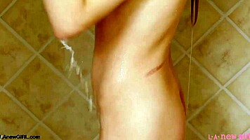 elegant blonde teen steps into steamy shower routine 🛁💦