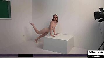 Watch this stunning blonde pose nude, teasing deepthroat in photoshoot