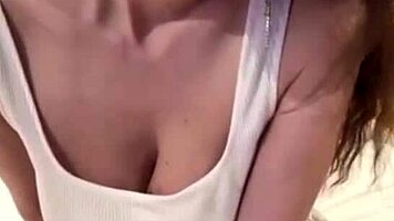 gorgeous horny milf in miniskirt masturbates big natural tits on webcam massage