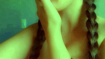 Hey check out this horny student masturbating messily with her wet skirt up