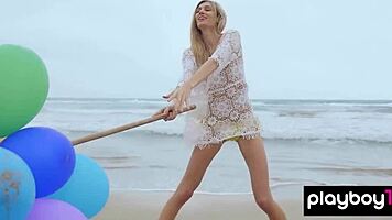 skinny italian milf blondie torino teases with beach balloons