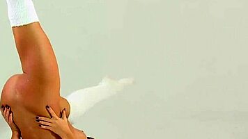 Brunette Gymnast Tonya Bellucci Stretches Petite Body with Big Tits and Acrobatic Poses