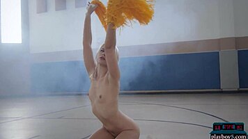 petite blonde milf cheerleader lennox elizabeth strips seductively on basketball court