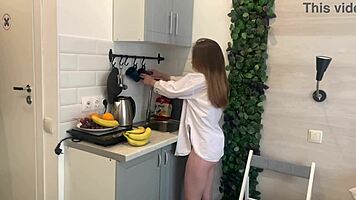 banana slips deep into her solo kitchen masturbation