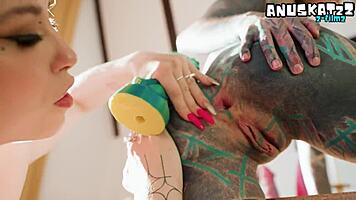 goth tattooed lesbians stretch each other's tight assholes with huge dildos intensely