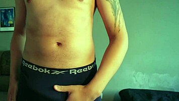 nerd brazilian strips underwear and jerks big cock moaning loud