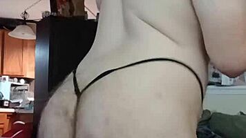 Big ass crossdresser teases thong shake