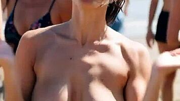 huge tits teen dances topless beach bounce!
