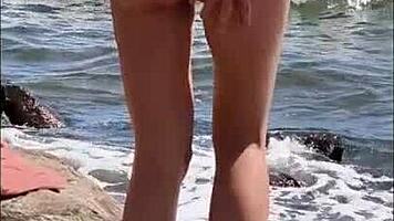 wanna see young lola spice pissing on public beach and shower? 😈