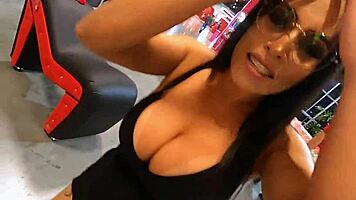 brunette babe rides giant cock at intimix expo event