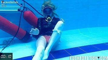 horny ashlee rose soaks wet pussy in slutty scuba dress underwater