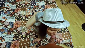 amateur babe in hat sucks cock then takes hard bedroom doggy