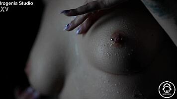 emo goth brunette strips slow revealing pierced nipples and tattoos