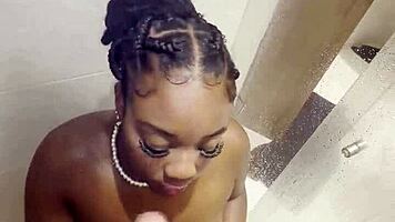 Ebony babe deepthroats monster cock in shower sloppy cum swallow