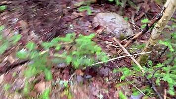 Petite Asian babe squirts wildly on massive rock
