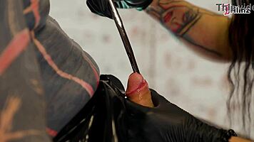 Three latex femdoms dominate tattooed slave with sounding and fingering torment 👠🔥
