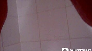 Hottie in the shower enjoys teasing the camera