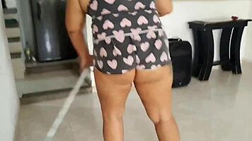curvy latina shows big ass while cleaning