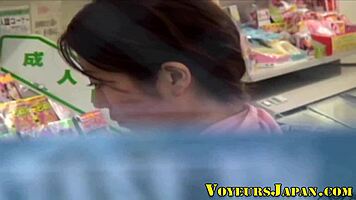 Horny japanese teen rubs pussy outdoors