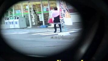 Horny japanese teen rubs pussy outdoors