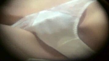 Horny japanese teen rubs pussy outdoors