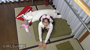 Japanese cosplay girl fits huge toys tightly