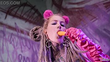 tattooed goth uses toys for double anal play