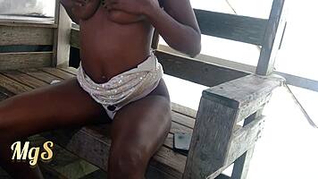 ebony slim teen flashes pussy at public bar
