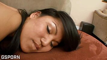 Asian Teen Practices Yoga Poses In Quiet Room