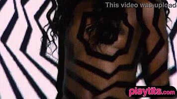 Slender petite ebony milf rips clothes to flaunt nude body