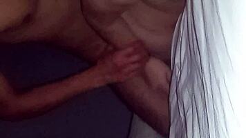 blonde couple explores hotel bedroom with intense passion