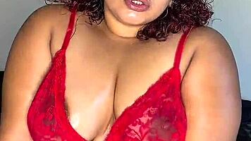 Curvy latina teases in red lingerie solo
