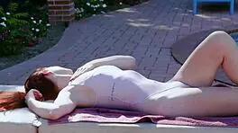 horny teen couple sunbathing
